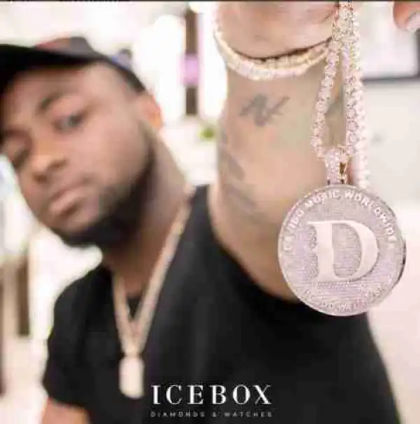 Davido Shows Off His New Diamond Encrusted DMW Necklace (Photos)